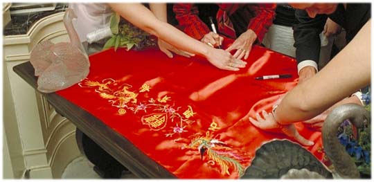 Signing in on a Chinese banner