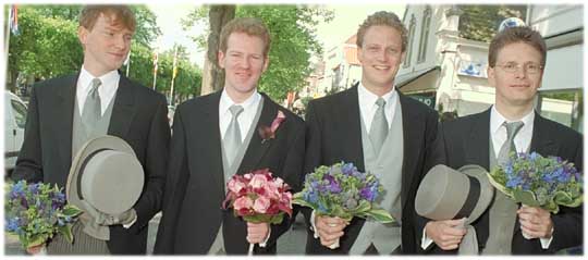 Groom and Groomsmen with bouquets
